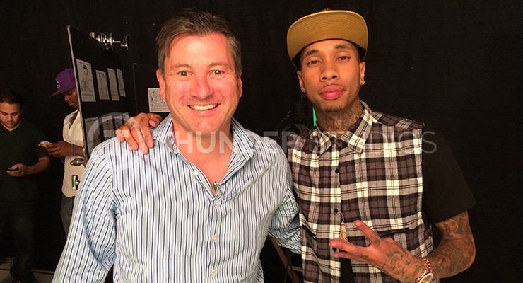 Tyga and Rodric David pose for a picture together behind the scenes at Thunder Studios