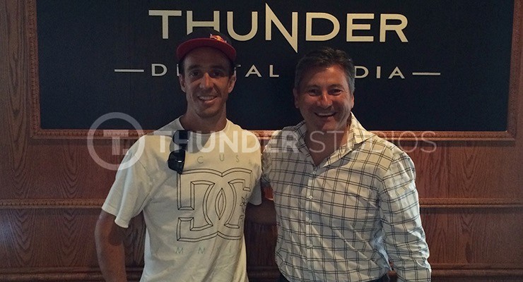 Rodric David and Robbie Maddison in front of Thunder logo